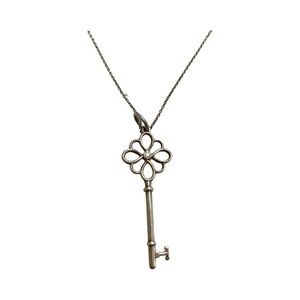 Tiffany & Co. Silver Knot Key Pendant Necklace with Diamonds and Chain